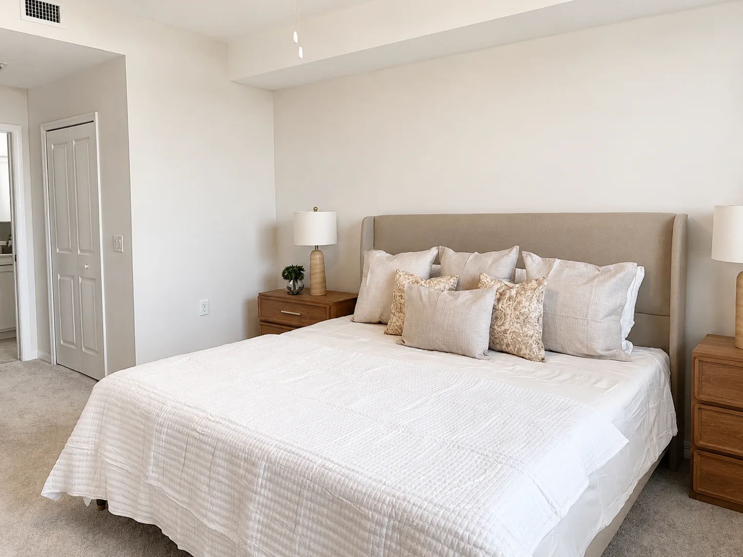 Primary bedroom at the Ave Maria Residence