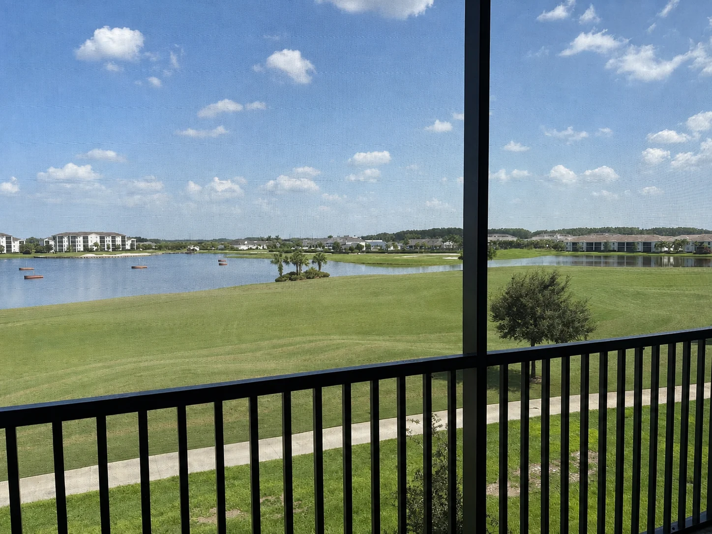 Panoramic view from the screened terrace at the Ave Maria Residence